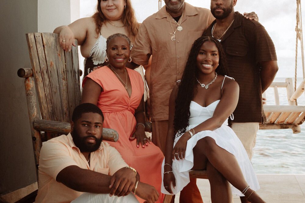 lifestyle family session sint maarten group family posing at luxury villa